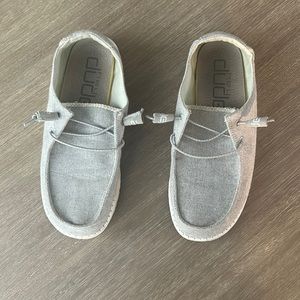 These are grey hey dudes from buckle size 8.5.